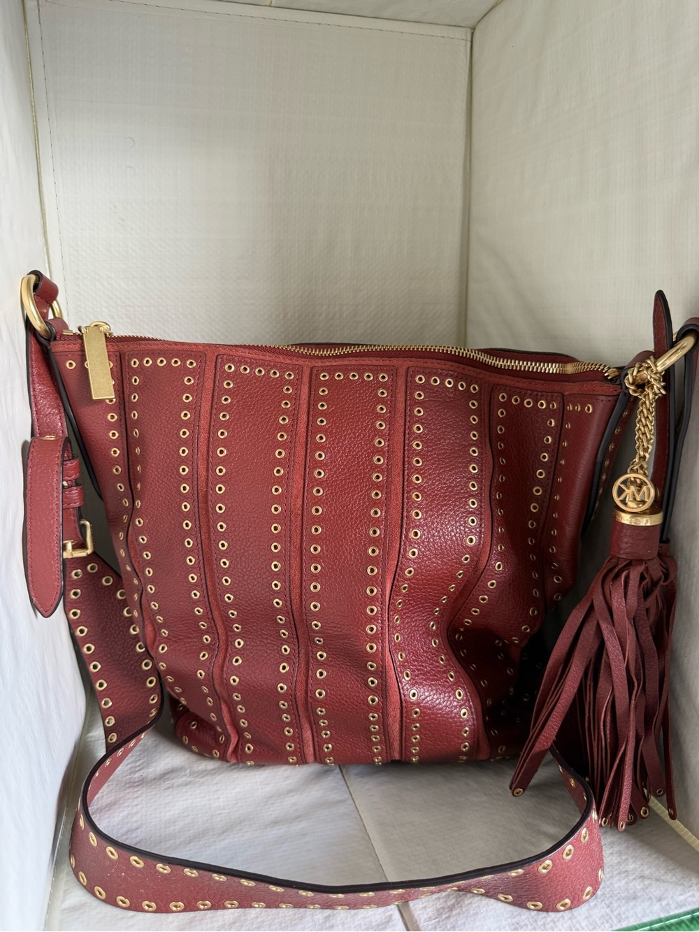 Michael Kors Burgundy Leather Eyelet Shoulder Bag with Tassel Charm